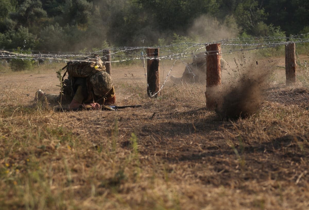 Ukrainian servicemen of the Shkval special battalion, 28th Separate Mechanized Brigade, ex-convicts, take part in military exercises at an unspecified location in the Donetsk region on July 26, 2024, amid the Russian invasion of Ukraine. (Photo by Anatolii STEPANOV / AFP)