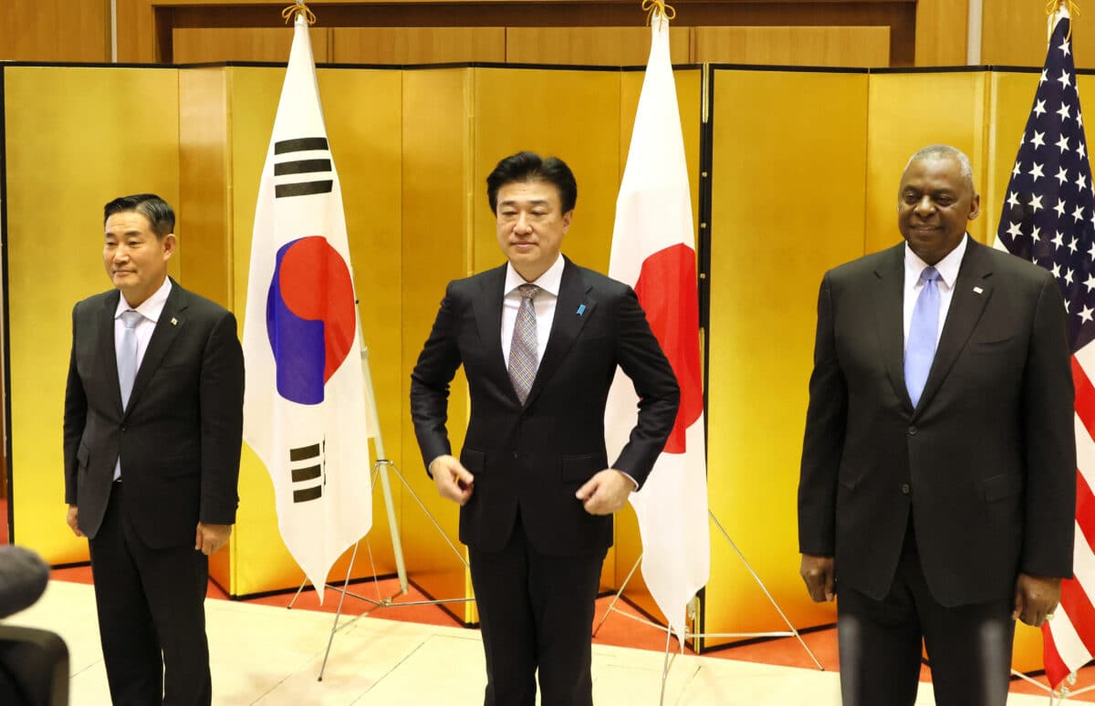 US Secretary of Defense Lloyd Austin (R), Japanese Defense Minister Minoru Kihara and South Korean Defense Minister Shin Won-sik (L) pose for photo prior to a Japan-US-South Korea trilateral defense ministers meeting at Japan's defense ministry in Tokyo on July 28, 2024. (Photo by YOSHIKAZU TSUNO / POOL / AFP)