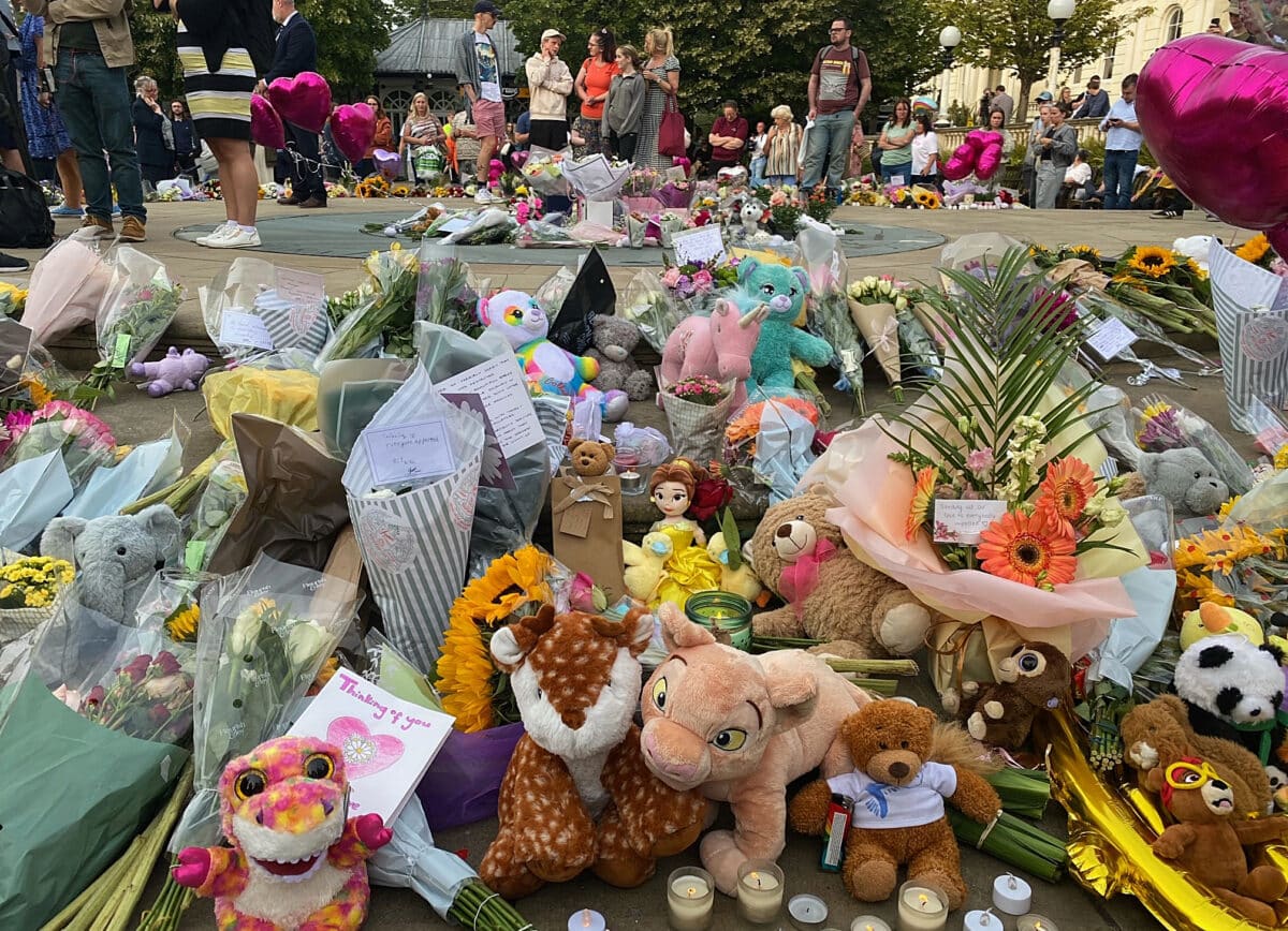 Floral tributes and soft toys are laid following a vigil in Southport, northwest England, on July 30, 2024, a day after a deadly child knife attack. Violent clashes broke out in the northern England town where a knife attack claimed the lives of three children, with around 100 protesters lighting fires and battling police. A 17-year-old male suspect from a nearby village arrested shortly after the incident remained in custody, police added, as they warned against speculating about his identity or details of the investigation.