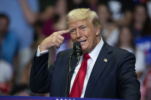 GRAND RAPIDS, MICHIGAN - JULY 20: Republican Presidential nominee former President Donald J. Trump holds his first public campaign rally with his running mate, Vice Presidential nominee U.S. Senator J.D. Vance (R-OH) (not pictured), at the Van Andel Arena on July 20, 2024 in Grand Rapids, Michigan. This is also Trump's first public rally since he was shot in the ear during an assassination attempt in Pennsylvania on July 13. Photo by Bill Pugliano/Getty Images) (Photo by BILL PUGLIANO / GETTY IMAGES NORTH AMERICA / Getty Images via AFP)