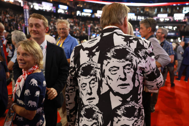 A man wears a jacket with the likeness of former U.S. President Donald Trump on the fourth day of the Republican National Convention at the Fiserv Forum on July 18, 2024 in Milwaukee, Wisconsin. Delegates, politicians, and the Republican faithful are in Milwaukee for the annual convention, concluding with former President Donald Trump accepting his party's presidential nomination. The RNC takes place from July 15-18. 