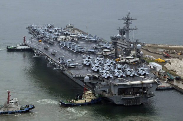 The Theodore Roosevelt (CVN 71), a nuclear-powered aircraft carrier is anchored in Busan, South Korea, on June 22, 2024. The newly-inaugurated Freedom Edge exercise is wrapping up in the East China Sea, having brought together Japanese, South Korean and American naval assets for multi-domain maneuvers for the first time.