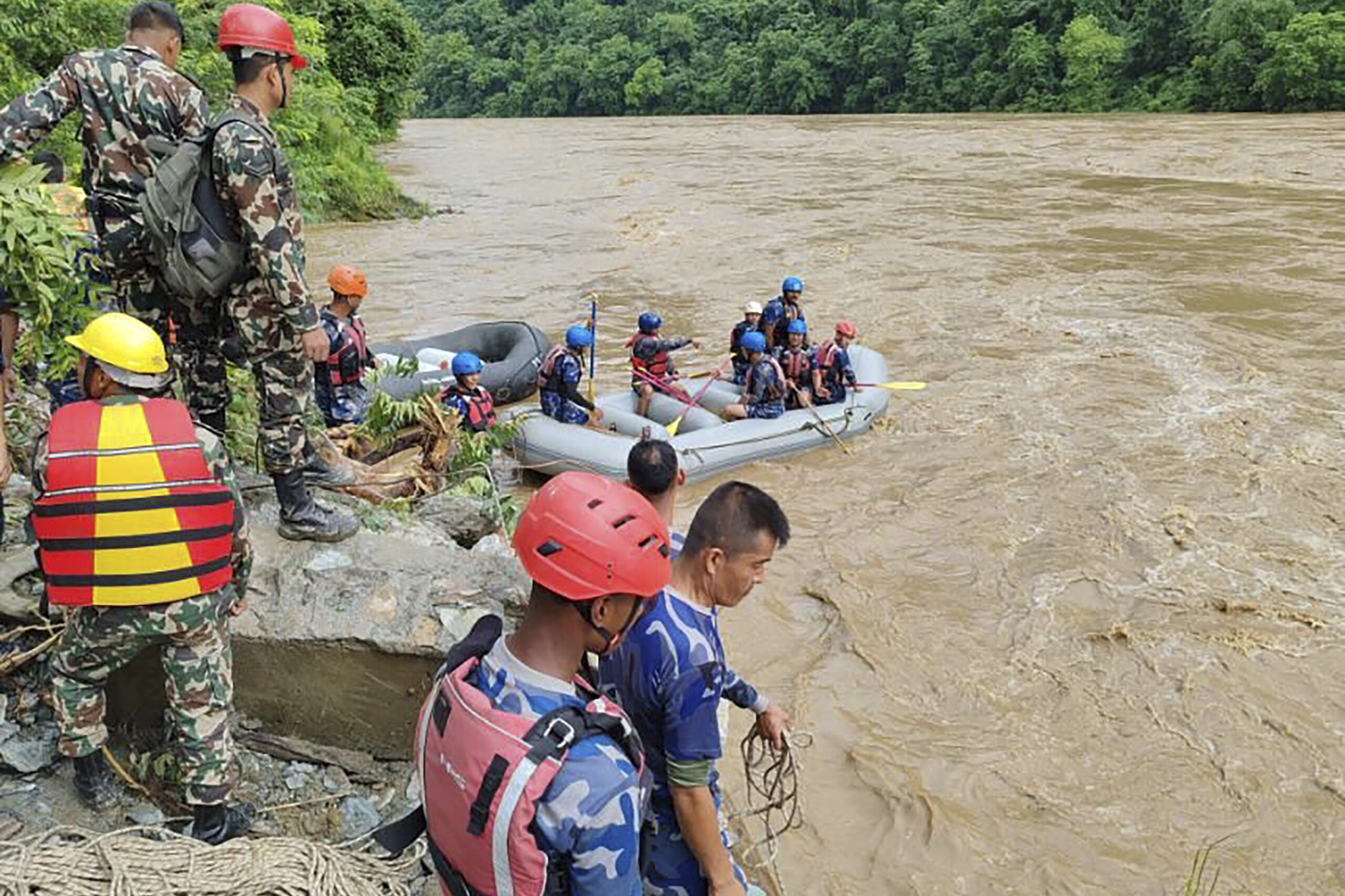 Nepal landslide sweeps 2 buses with over 50 people into river