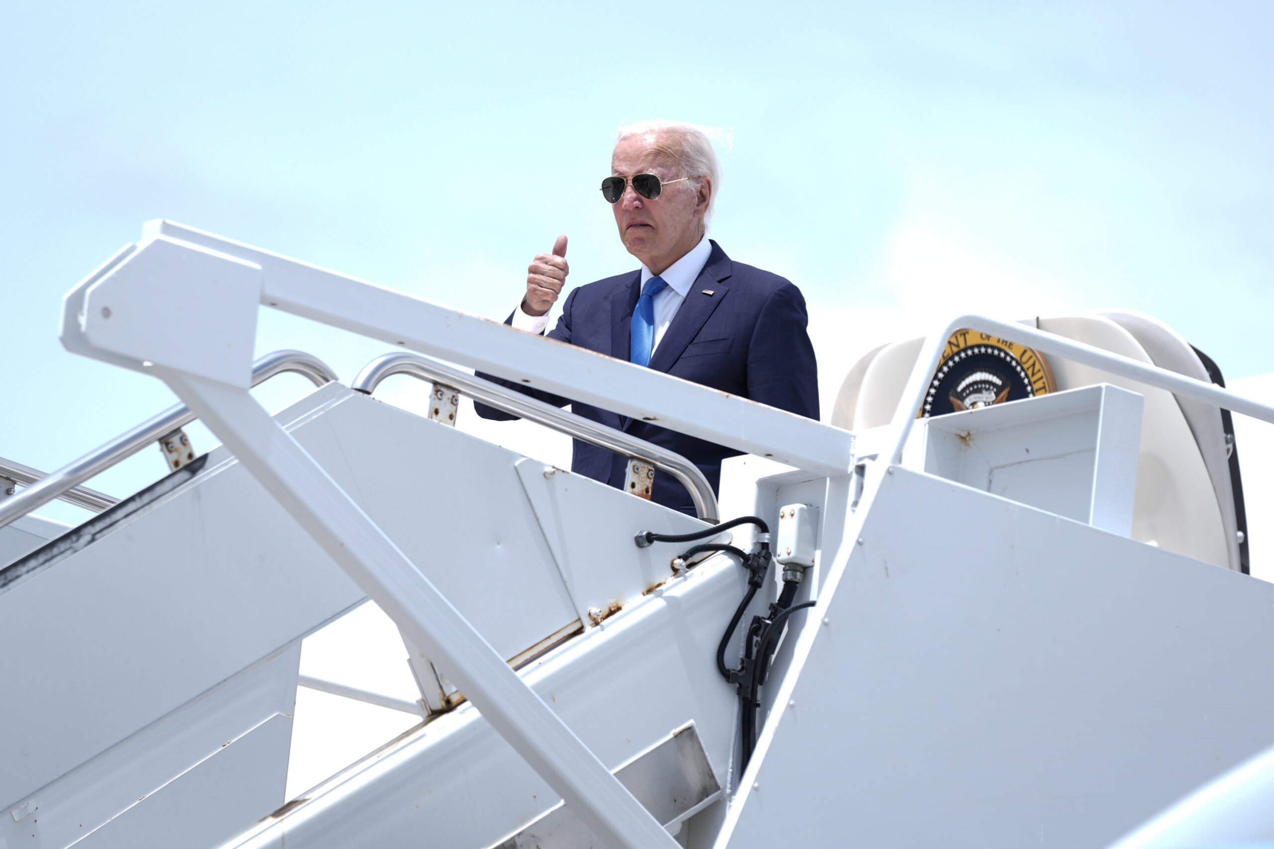 President Joe Biden boards Air Force One at Dover Air Force Base in Dover, Delaware, Tuesday, July 23, 2024.