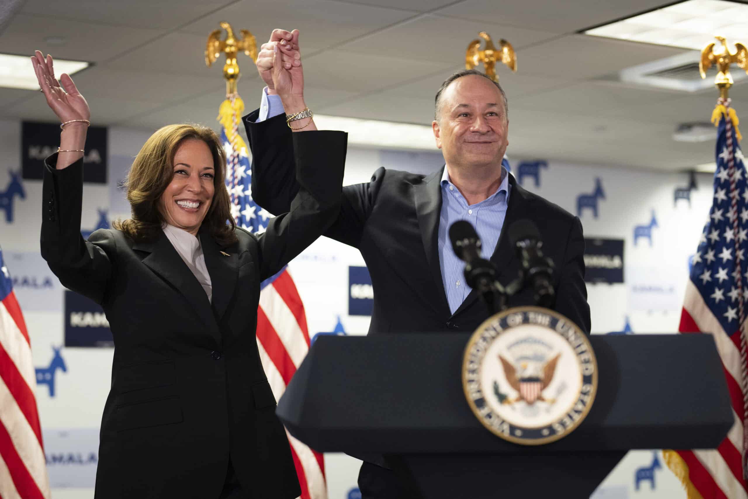 Vice President Kamala Harris, left, and second gentleman Doug Emhoff address staff at her campaign headquarters in Wilmington, Del., July 22, 2024. The nation's first second gentleman, Emhoff could become its first first gentlemen after November.