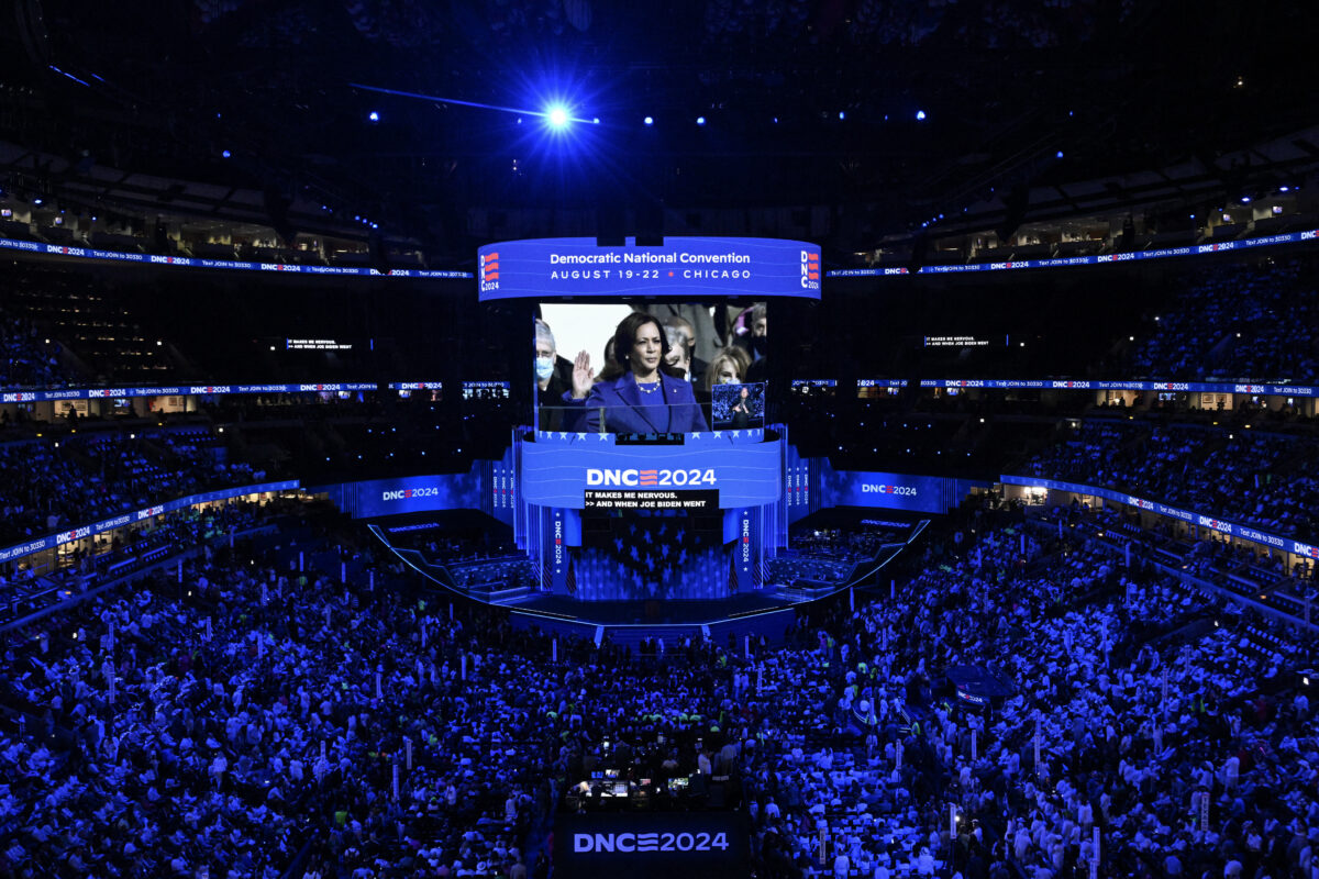 A video featuring US Vice President and Democratic presidential candidate Kamala Harris is played during the fourth and last day of the Democratic National Convention (DNC) at the United Center in Chicago, Illinois, on August 22, 2024. - Vice President Kamala Harris will formally accept the party’s nomination for president today at the DNC which ran from August 19-22 in Chicago. 