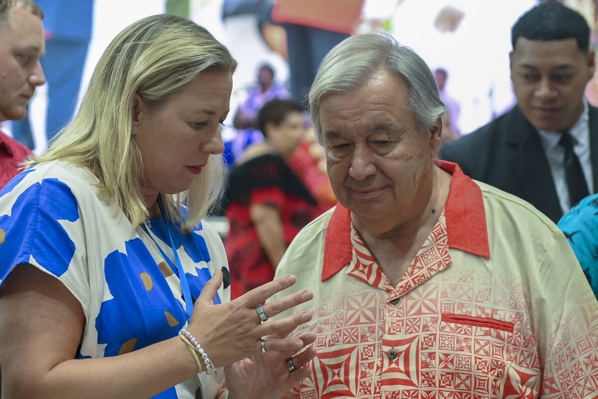 This handout photo taken and released on August 26, 2024 by the European Commission shows Jutta Urpilainen (L), European Commissioner for International Partnerships, speaking with UN Secretary General Antonio Guterres during the Pacific Islands Forum meeting in Nuku'alofa. 