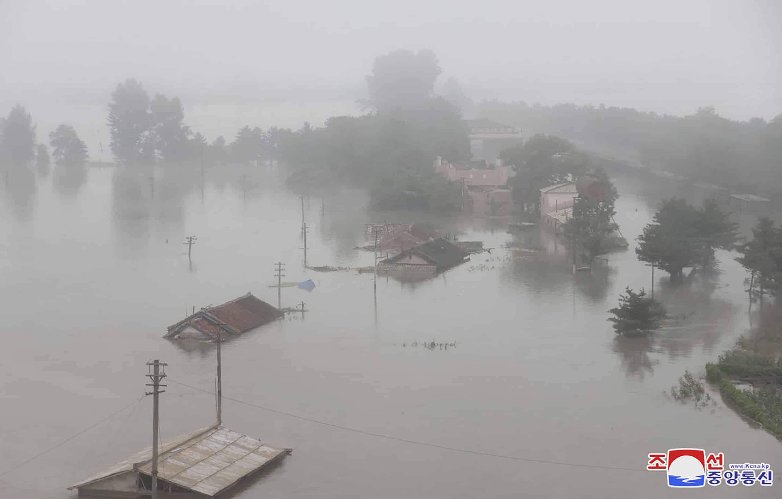 This undated photo provided on Wednesday, July 31, 2024 by the North Korean government, shows a flood-hit area in Sinuiju city, North Phyongan province, North Korea. 