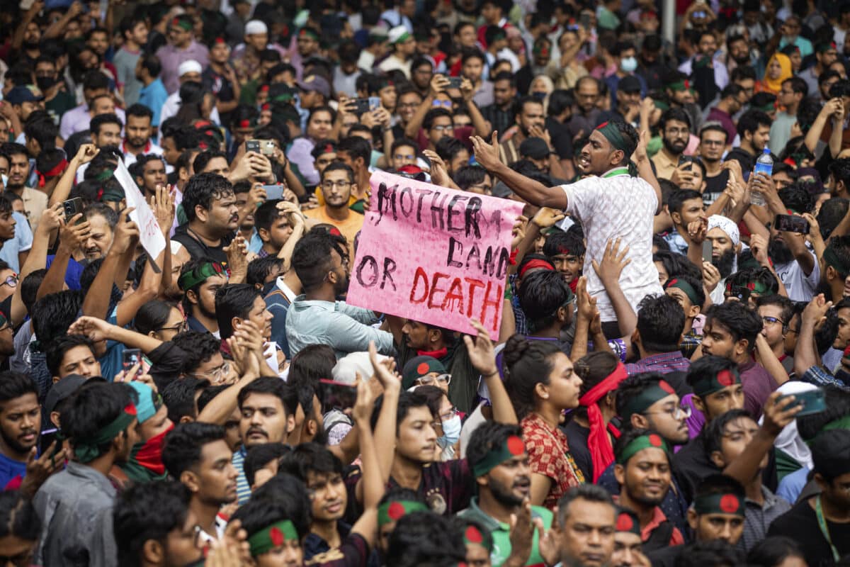 People participate in a protest march against Prime Minister Sheikh Hasina and her government to demand justice for the victims killed in the recent countrywide deadly clashes, in Dhaka, Bangladesh, 