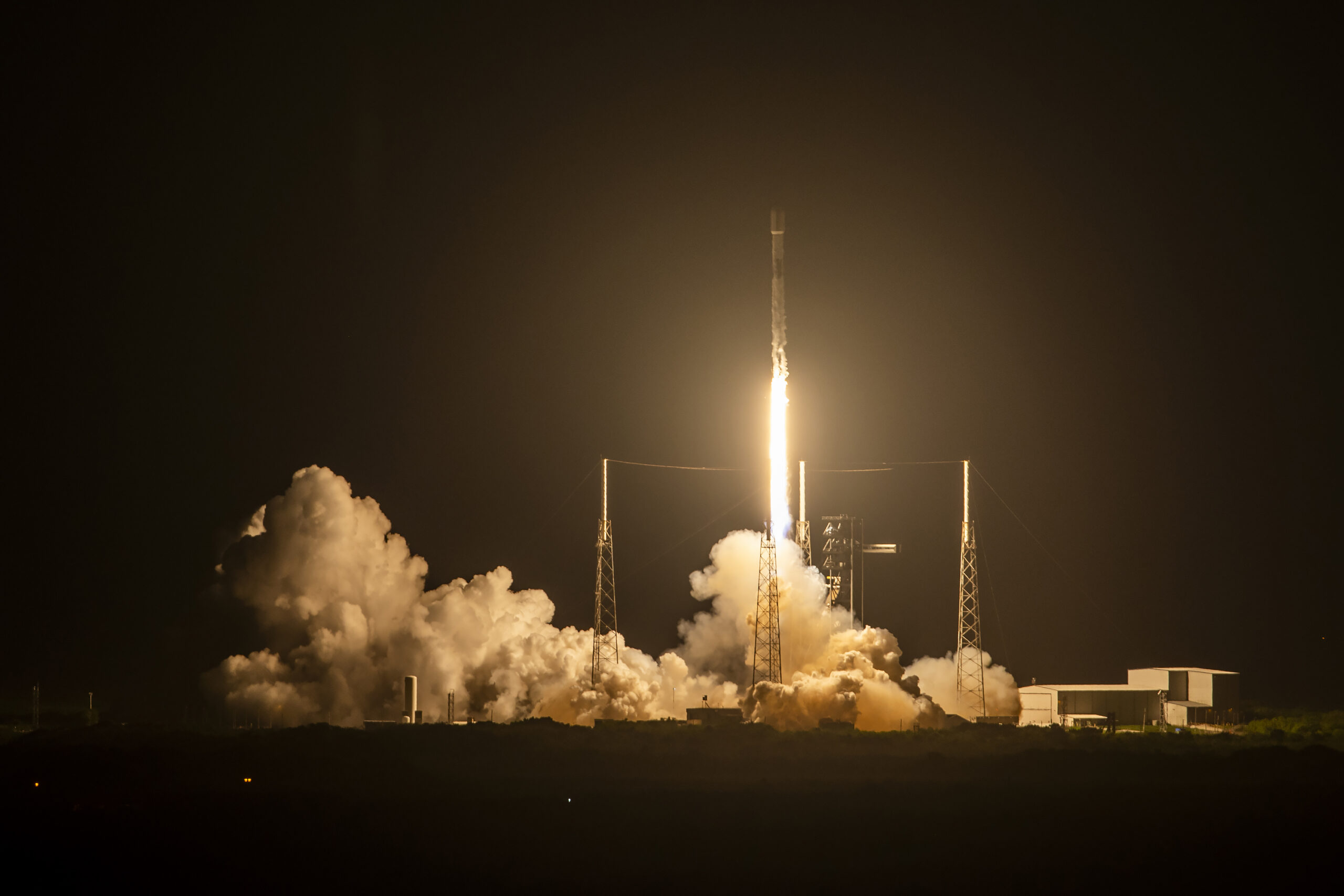 In this photo provided by SpaceX, the SpaceX Falcon 9 rocket, carrying 21 Starlink internet satellites, launches from Cape Canaveral, Fla., on Wednesday, Aug. 28, 2024. (SpaceX via AP)