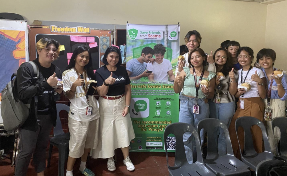 Mel Migriño, Gogolook Southeast Asia Regional Director and Philippines Country Representative with students from PUP-Manila