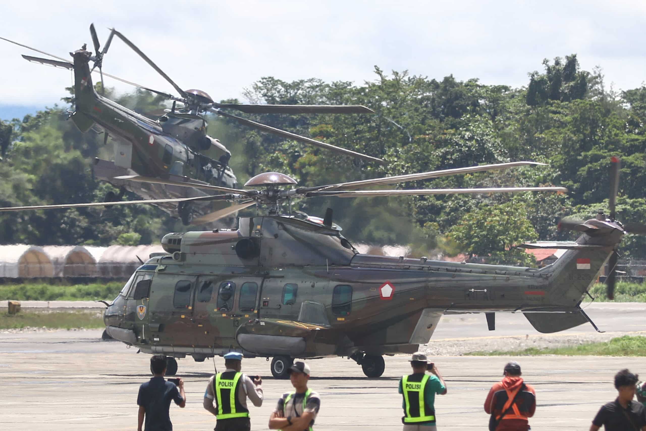 Indonesian forces retrieve New Zealand pilot's body in Papua