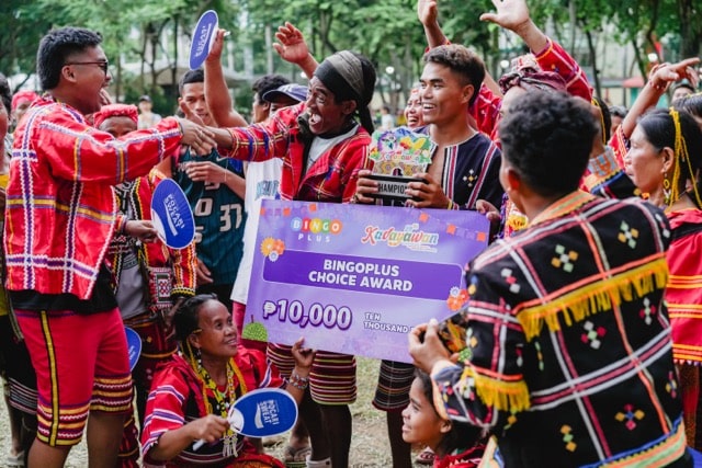 One of the overall champions of the Dula sa Kadayawan event, holding their BingoPlus Choice Award.