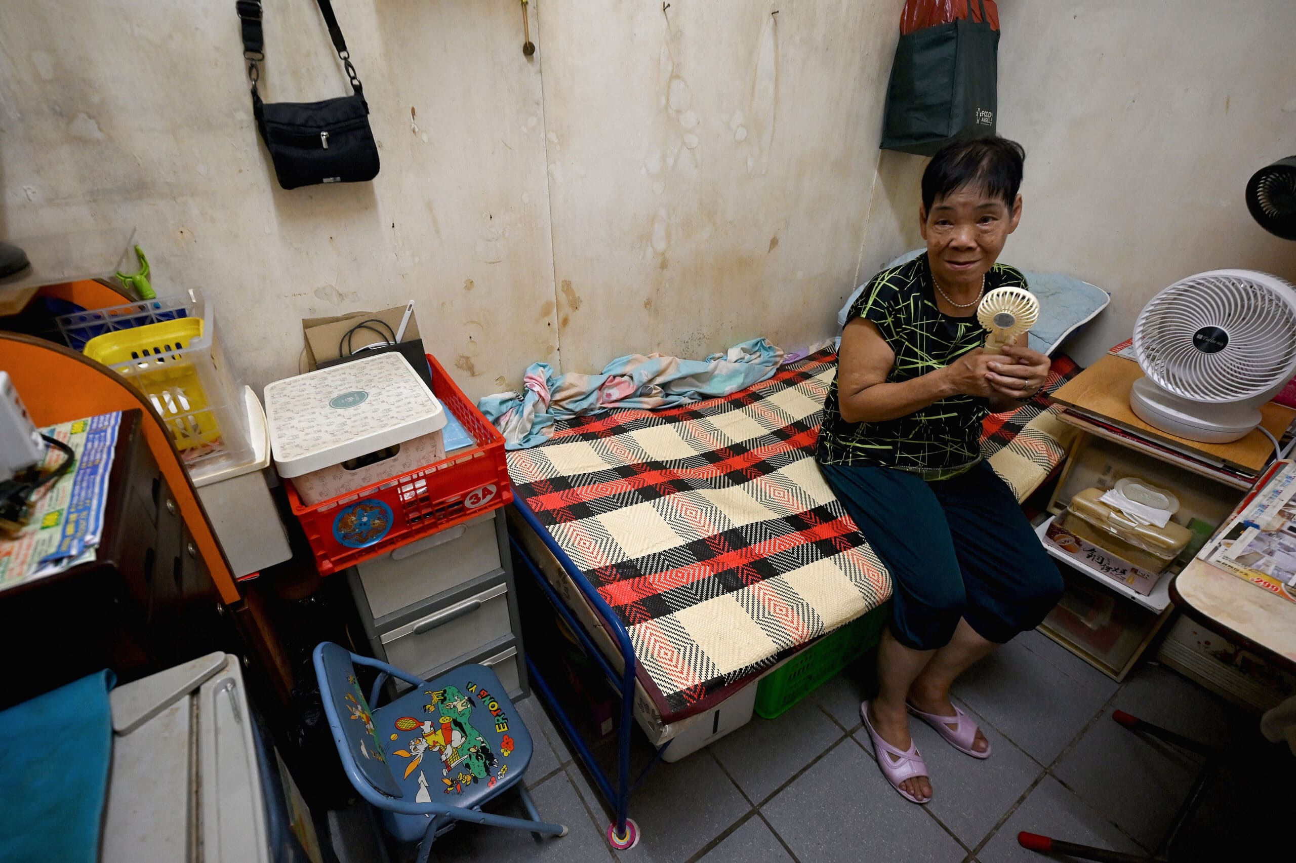 Scorching heat magnifies housing crunch for Hong Kong's elderly