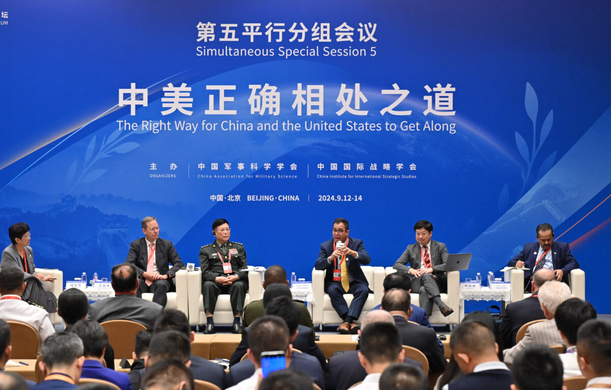 Chinese army Lieutenant General He Lei (3rd L) attends a forum on The Right Way for China and United States to Get Along during the 11th Xiangshan Forum at the Beijing International Convention Center on September 13, 2024.