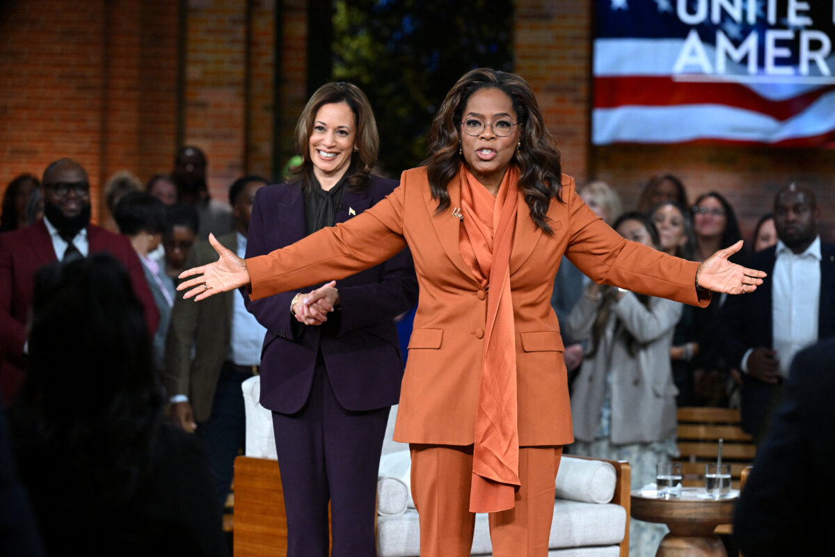 US Vice President and Democratic presidential candidate Kamala Harris (L) joins US television producer Oprah Winfrey at a 'Unite for America' live streaming rally in Farmington Hills, Michigan, on September 19, 2024. 