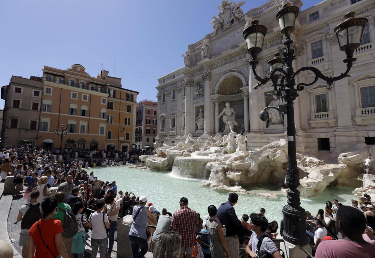 Tourists admire the Trevi Fountain in Rome, June 7, 2017. 