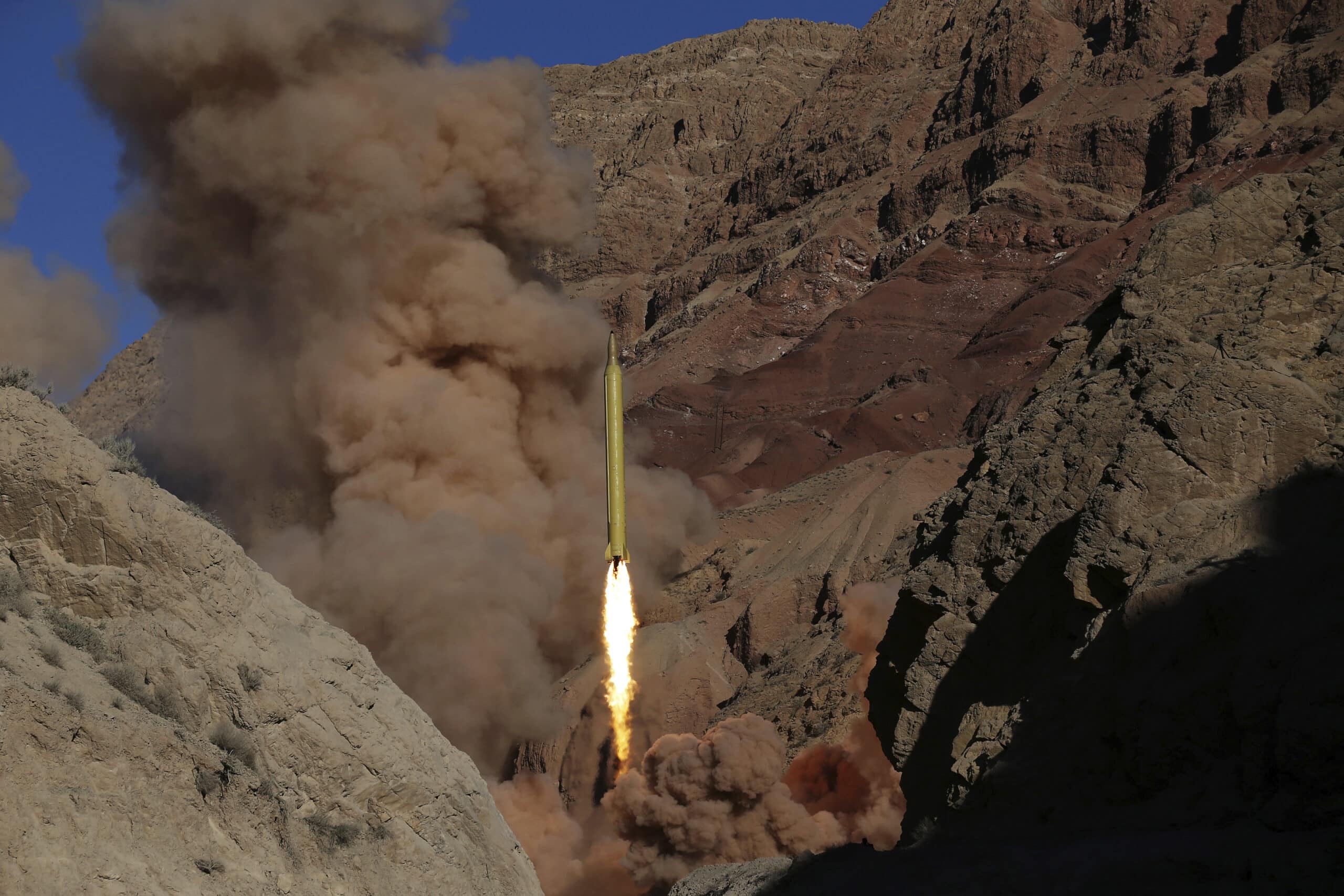 A Qadr H long-range ballistic surface-to-surface missile is fired by Iran's Revolutionary Guard during a maneuver in an undisclosed location in Iran, on March 9, 2016. (AP Photo/Omid Vahabzadeh, File)