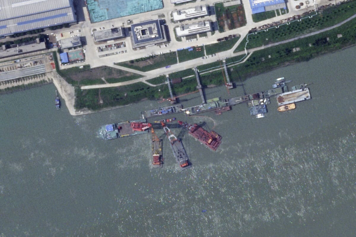 This satellite image from Planet Labs PBC shows what appears to be a sunken Chinese submarine at a shipyard near Wuhan, China, June 15, 2024.