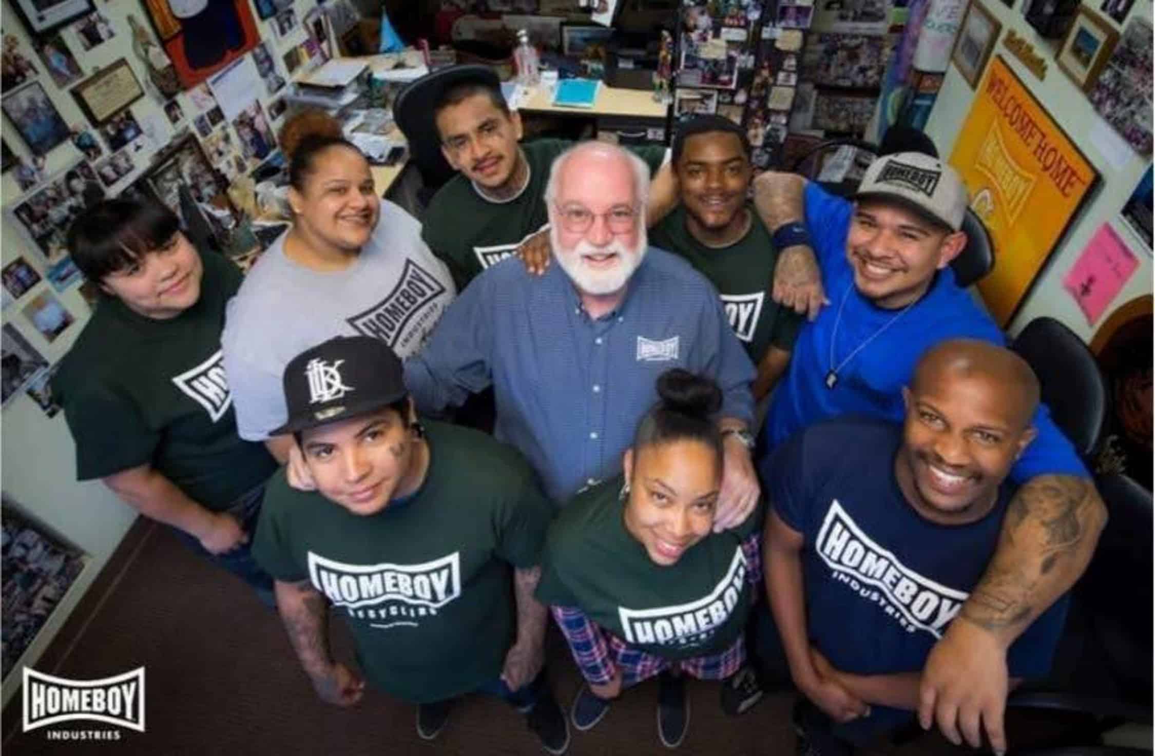 ESCAPE FROMLA GANG LIFE Fr. Gregory Boyle (center), seenhere with some of the Los Angeles youths whose lives have been transformed by Homeboy Industries, was recently in the country for a talk at the Ateneo de Manila University and a retreat in Silang, Cavite. 