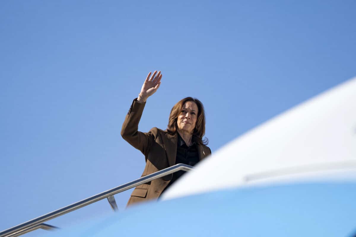 US Vice President and Democratic presidential candidate Kamala Harris waves as she boards Air Force Two from Sky Harbor International Airport in Phoenix, Arizona, on October 11, 2024.