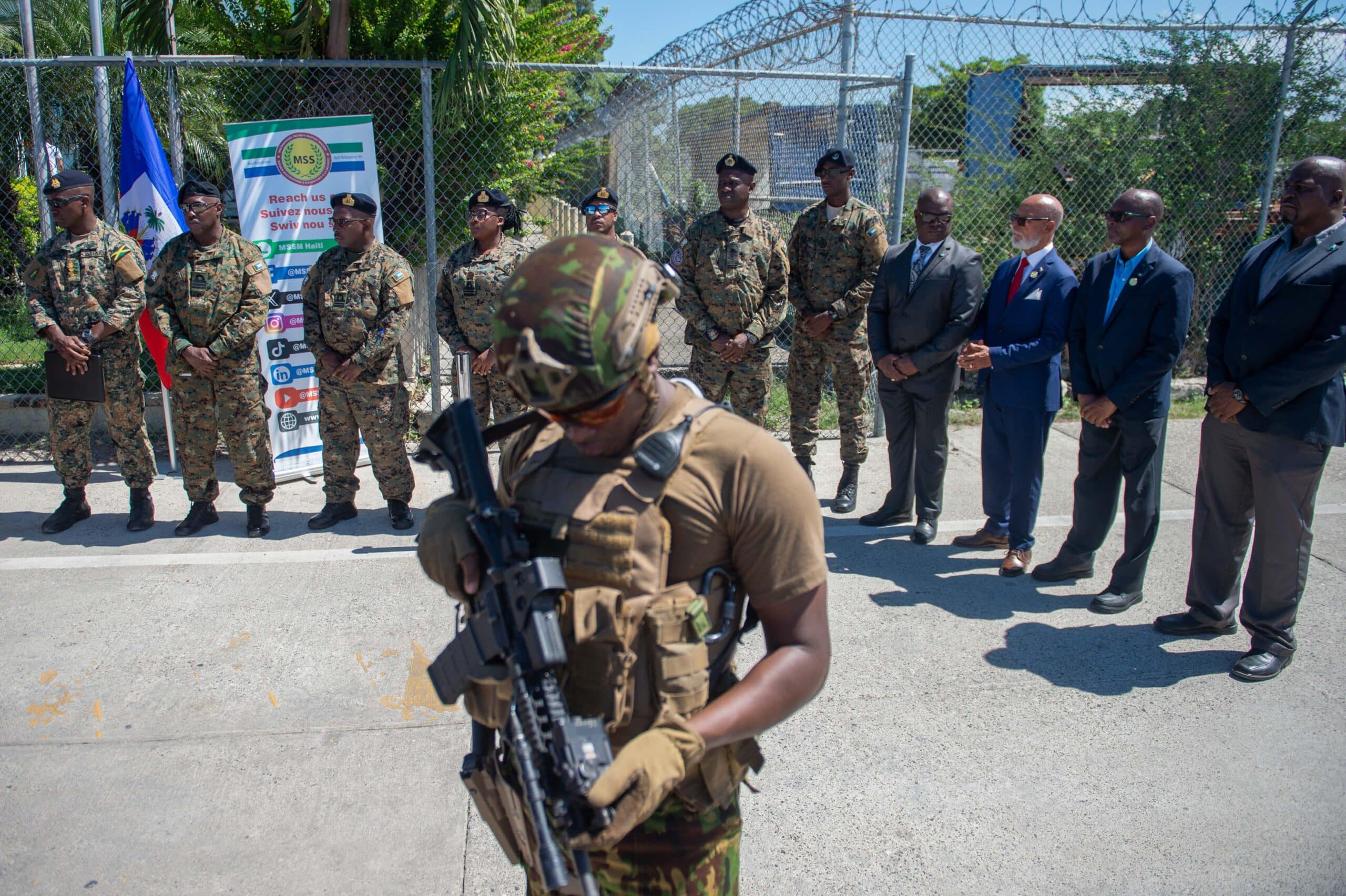 Members of the Royal Bahamas Defence Force arrive at Toussaint Louverture International Airport in Port-au-Prince, Haiti, on October 18, 2024. - Later today, the United Nations is scheduled to vote on a draft resolution that would extend sanctions and aim to address ongoing security concerns in Haiti. More than 3,600 people have been killed this year in "senseless" gang violence in Haiti, according to the UN human rights office. (Photo by Clarens SIFFROY / AFP)