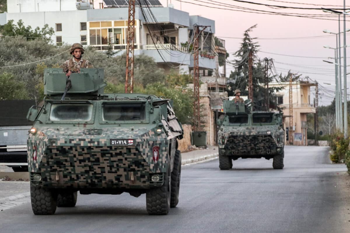 Lebanese Army vehicles patrol the area of Marjayoun in southern Lebanon near the border with Israel on October 25, 2024. - Israel expanded operations in Lebanon nearly a year after Hezbollah began exchanging fire in support of its ally, Hamas, following the Palestinian group's deadly attack on Israel on October 7, 2023.