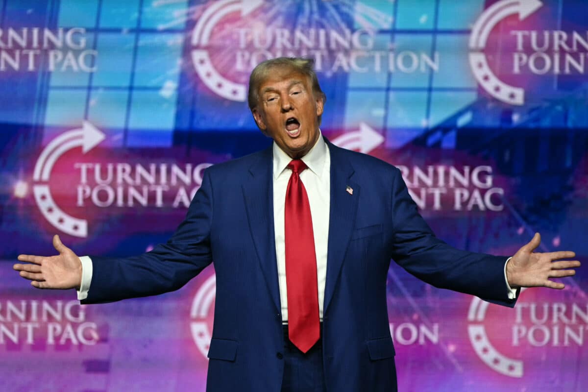 Former US President and Republican presidential candidate Donald Trump gestures as he arrives to speak during a Turning Point Action 'United for Change' campaign rally in Las Vegas, Nevada on October 24, 2024. (Photo by Patrick T. Fallon / AFP)