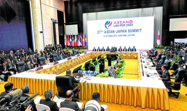 Marcos back in Manila from 3-day Asean meetings in Laos