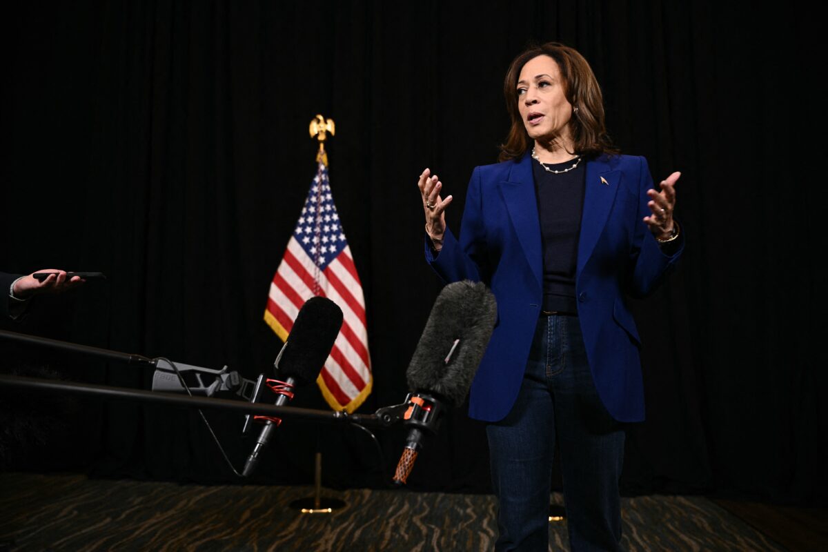 Democratic presidential nominee, US Vice President Kamala Harris speaks to members of the media before leaving her hotel in Madison, Wisconsin on October 31, 2024. - Kamala Harris criticized Donald Trump's latest remarks in which he vowed to protect women in America whether they "like it or not," describing her White House rival's comments as "very offensive." 