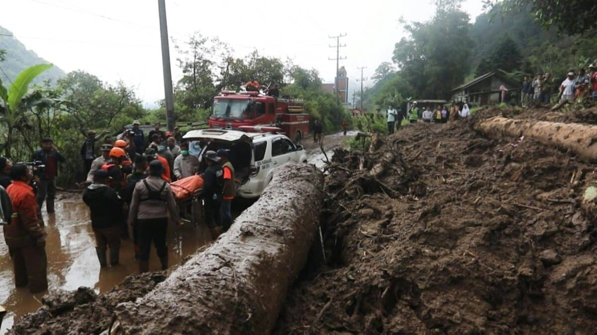 Indonesia digs out as flooding, landslide death toll hits 20