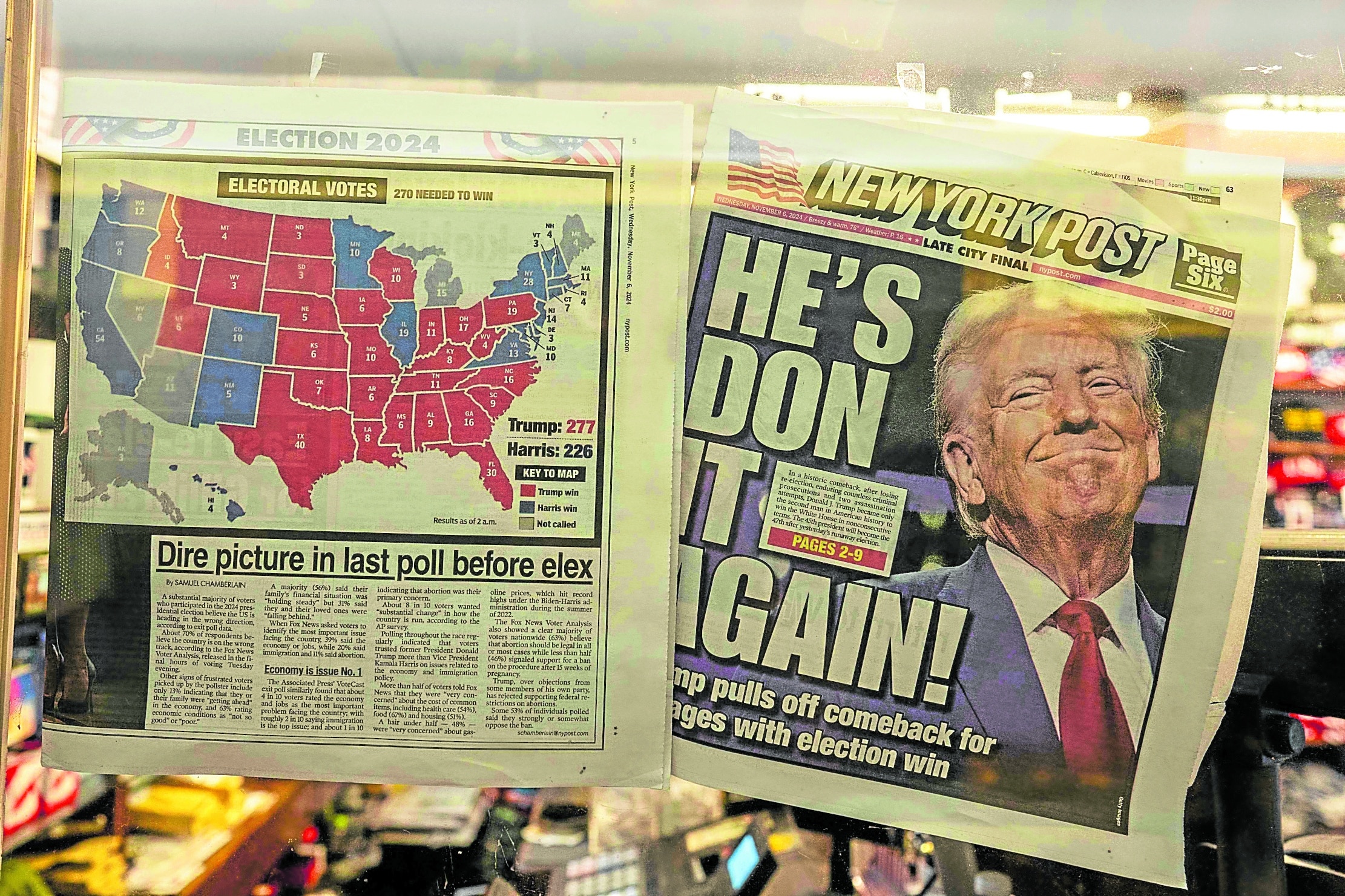 WHAT CLOSE FIGHT? The NewYork Post banners Donald Trump sweeping victory on Wednesday that clinched hima second term as US president after four years. 