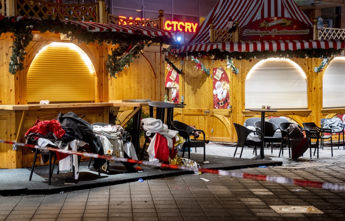 PHOTO: Clothes and blankets at German Christmas market after attack FOR STORY: Germany got tipoffs about suspect in Christmas market attack