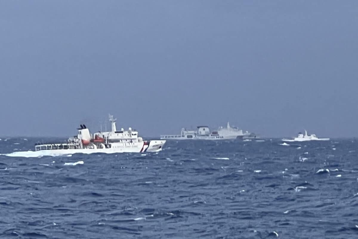 This handout photograph taken between December 7-8, 2024 and released on December 9 by the Taiwan Coast Guard shows a Chinese coast guard ship (C) seen past Taiwan Coast Guard vessels (L and R) in waters east of Taiwan. - Taiwan's coast guard said December 9 it had detected "unusual movements" of seven Chinese coast guard ships since the early hours of December 6 -- the day Taiwan President Lai Ching-te returned to Taipei following a Pacific tour last week that included two stopovers on US soil. There was no immediate public announcement by the PLA or Chinese state media about increased military activity around Taiwan.