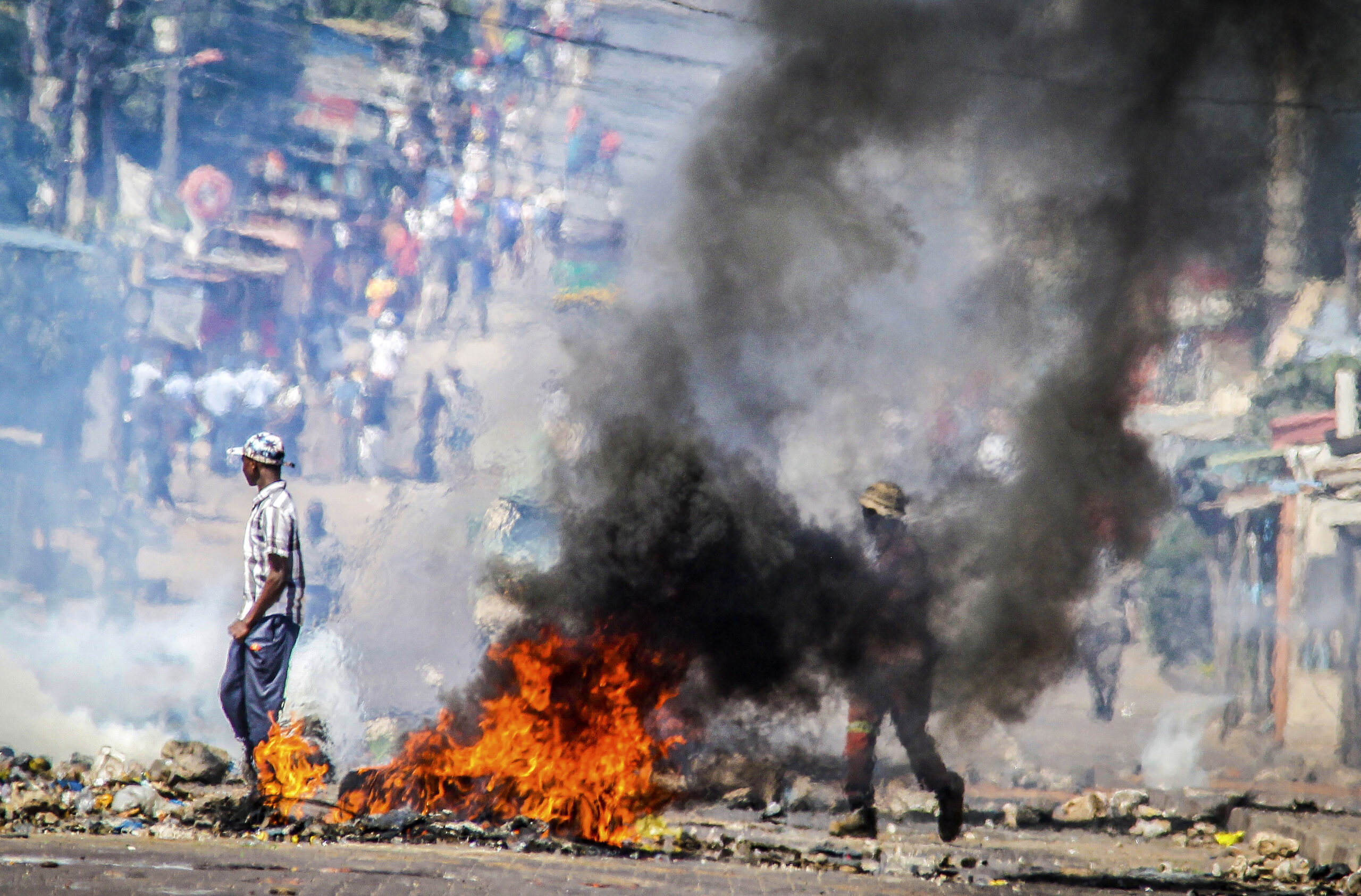 Mozambique erupts in violence after election court ruling; 21 dead