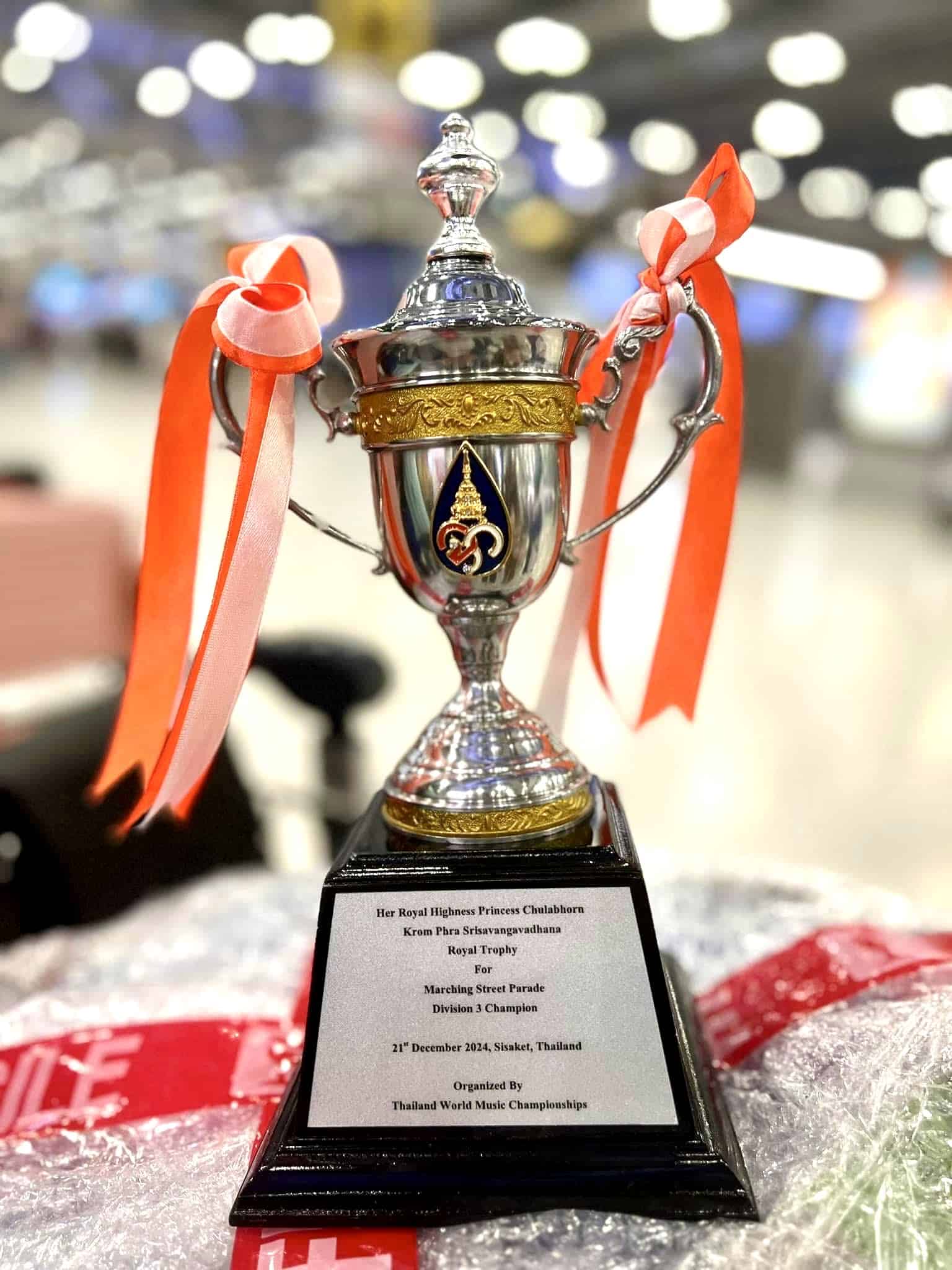 The "Royal Trophy" is presented to the Philippine delegates for winning first place in the marching street parade. (Photo courtesy of Liberty Valderrama)