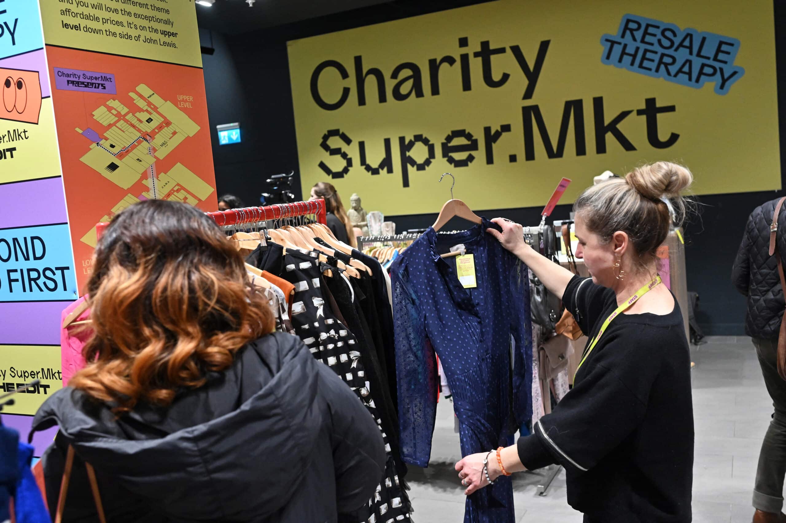 DEMAND FOR ‘PRELOVED’Customers shopping at Charity Super.Mkt, a brand which aims to establish shops selling secondhand goods in empty shopping centers and high street spaces, choose clothes to buy as possible Christmas gifts.