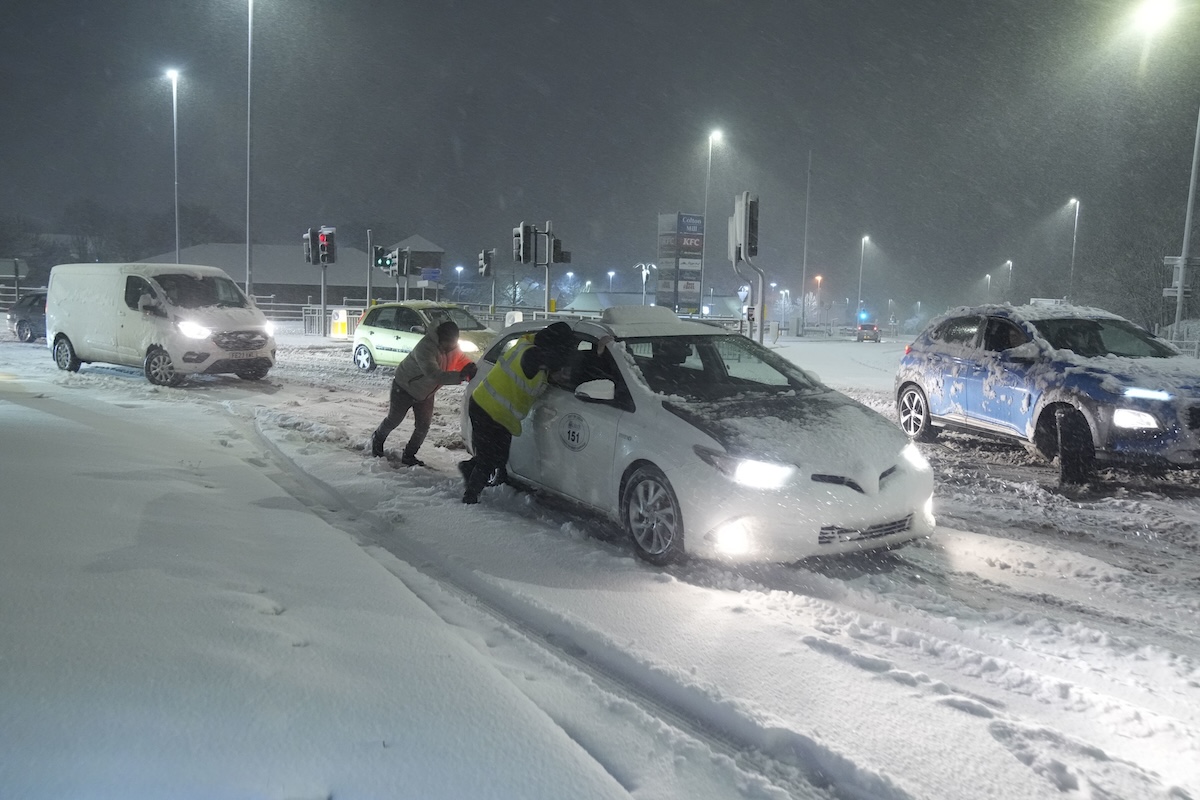 PHOTO: Cars stuck in snow in Leeds in the UK FOR STORY: Heavy snow brings widespread disruption across the UK