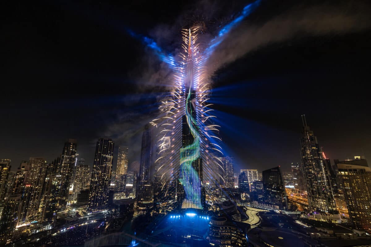 This photograph shows fireworks exploding around the Burj Khalifa Tower during New Year's celebrations in Dubai on January 1, 2025. (Photo by FADEL SENNA / AFP)