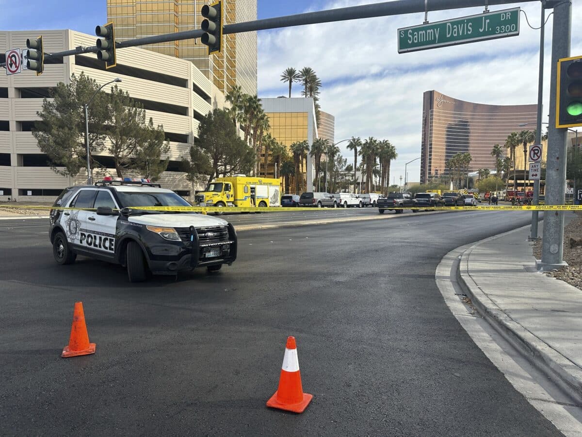 Police block the area after a vehicle caught fire and exploded outside the lobby of President-elect Donald Trump's hotel Wednesday, Jan. 1, 2025.