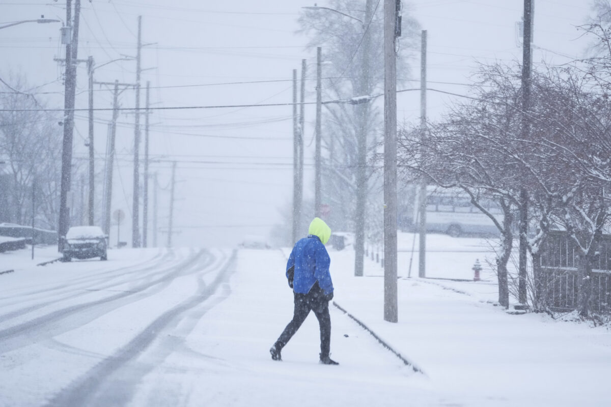 Powerful winter storm causes flight delays, school closings