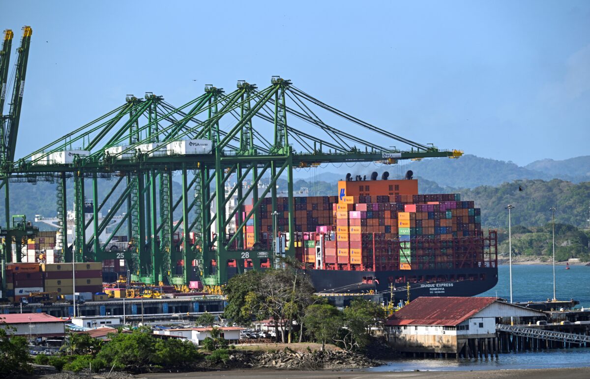 A cargo ship waits at Balboa port before crossing the Panama Canal in Panama City on February 4,2025. Two Panamanian lawyers filed a complaint Monday to cancel the concession of a Hong Kong-based company for operating two ports on the Panama Canal, following US President Donald Trump's threats to seize the vital waterway. (Photo by Martin BERNETTI / AFP)