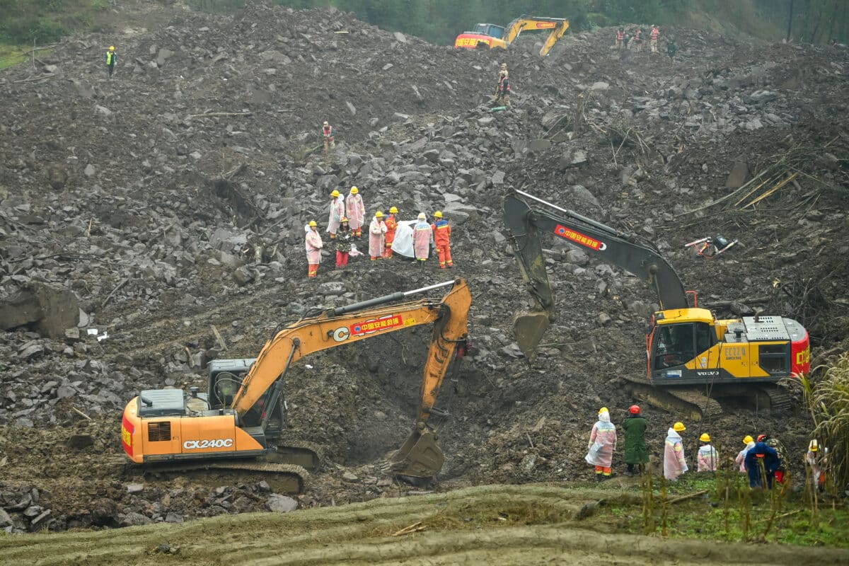 Rescuers work at the site of a landslide in Jinping village in the city of Yibin, in Chinas southwest Sichuan province on February 9, 2025. A landslide in China's southwestern Sichuan province triggered by heavy rain has killed at least one person, with nearly 30 more missing, state media said on February 9.