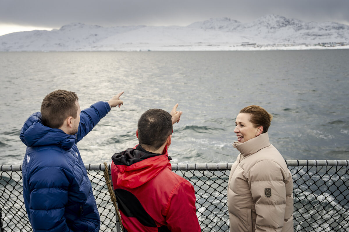 Denmark's Prime Minister Mette Frederiksen, right, Greenlands acting head of government Múte Bourup Egede, center, and newly elected head of government, Jens-Frederik Nielsen, left, speak aboard the Defense's inspection vessel Vaedderen, in the waters around Nuuk, Greenland, Thursday, April 3, 2025.