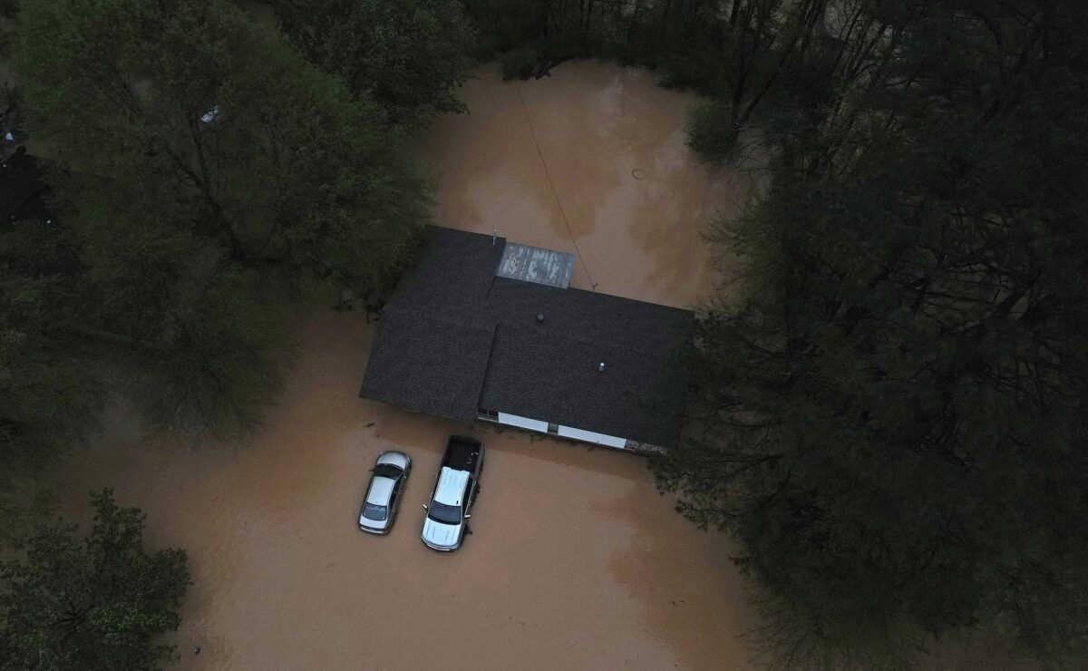 16 dead in flooding and tornadoes as storms slash from Texas to Ohio