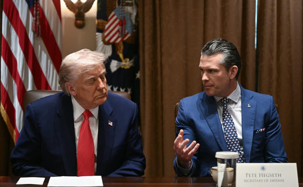 (FILES) (L-R) US President Donald Trump looks on as Secretary of Defense Pete Hegseth speaks during a cabinet meeting in the Cabinet Room of the White House on April 10, 2025, in Washington, DC. US Defense Secretary Pete Hegseth shared information on forthcoming US air strikes on Yemen in a private Signal chat group that included his wife, brother and personal lawyer, the New York Times reported on April 20.AFP was not able to independently verify the Times' report, which detailed what would be the second time Hegseth has been accused of sharing sensitive military information on the commercial messaging app with unauthorized personnel. — Photo by Agence France Presse