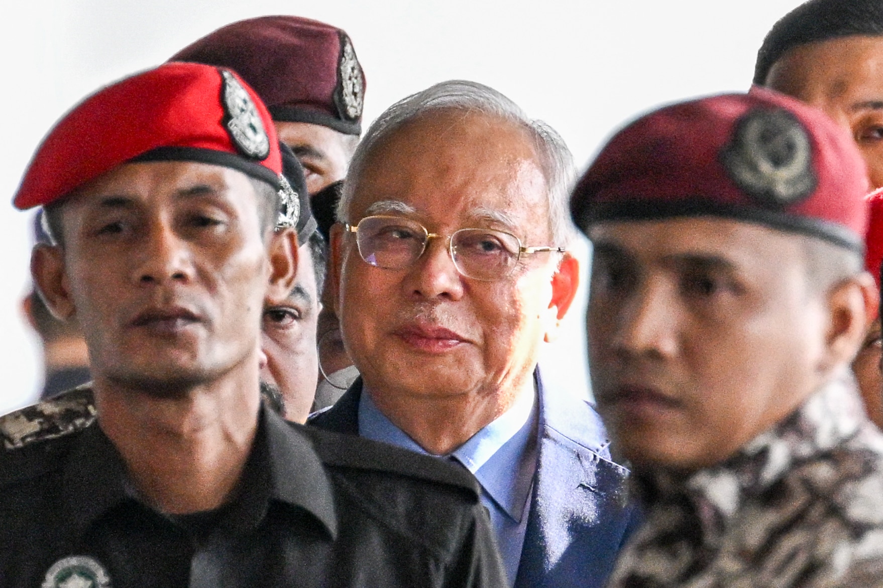 Ex-Malaysia PM Najib convicted of looting state investment fund