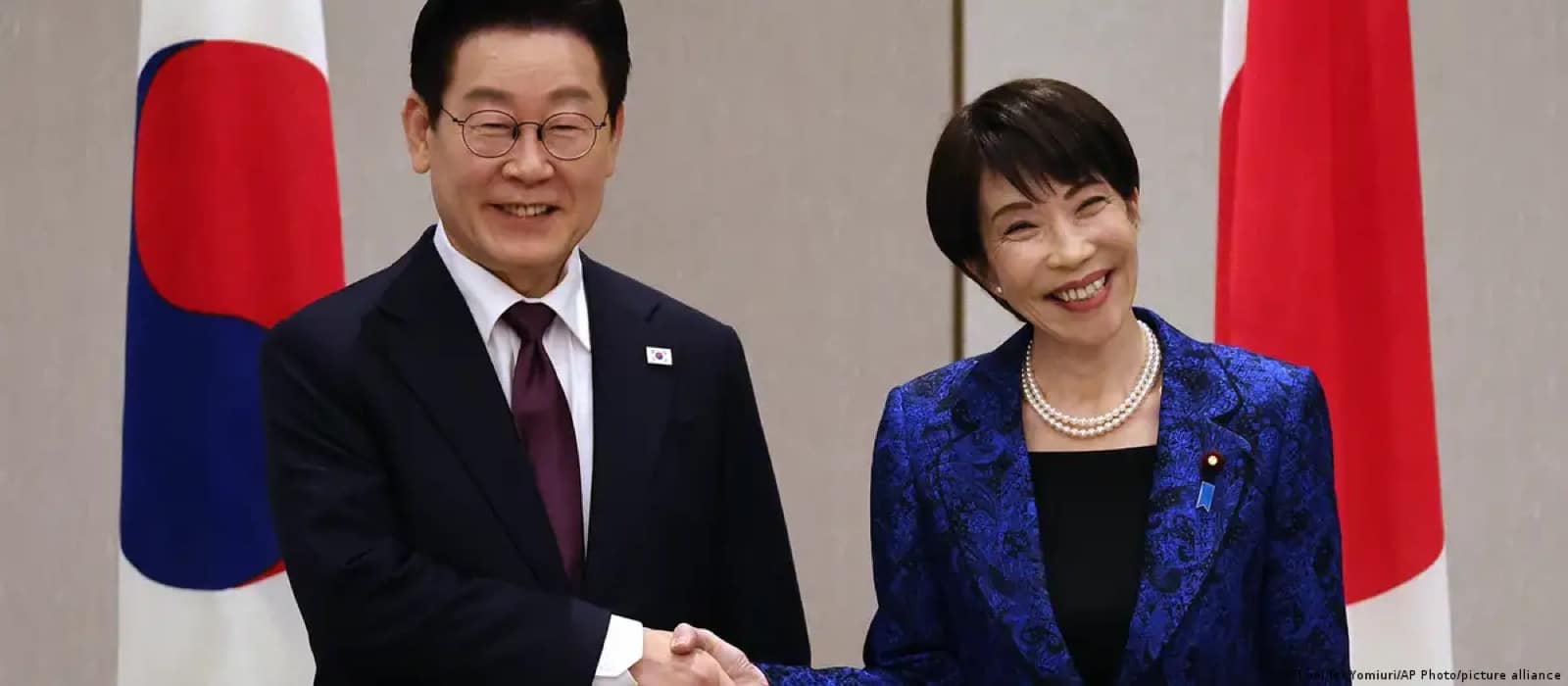 Japan, South Korea vow stronger ties amid China challenge