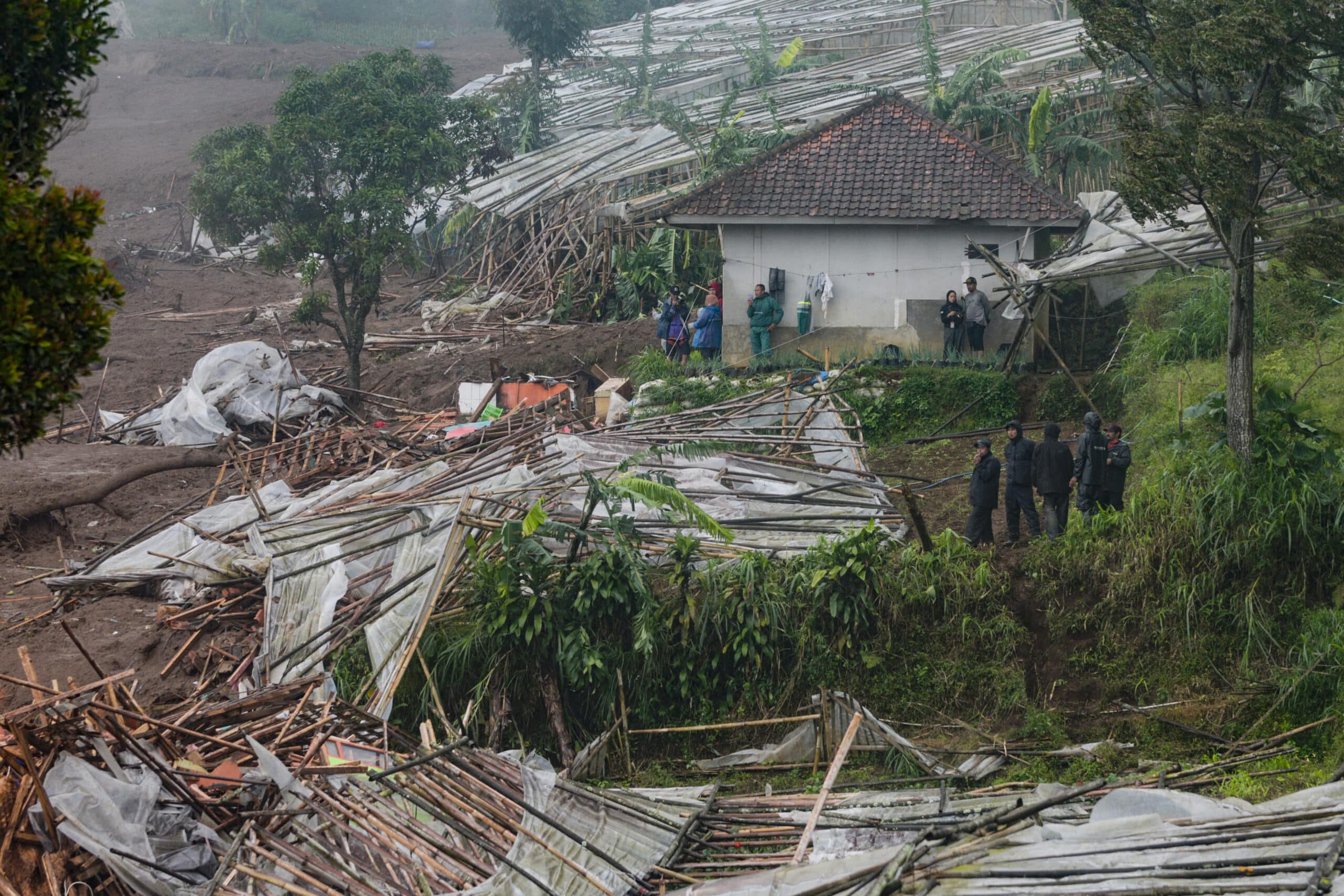 Indonesia landslide kills eight, more than 80 missing