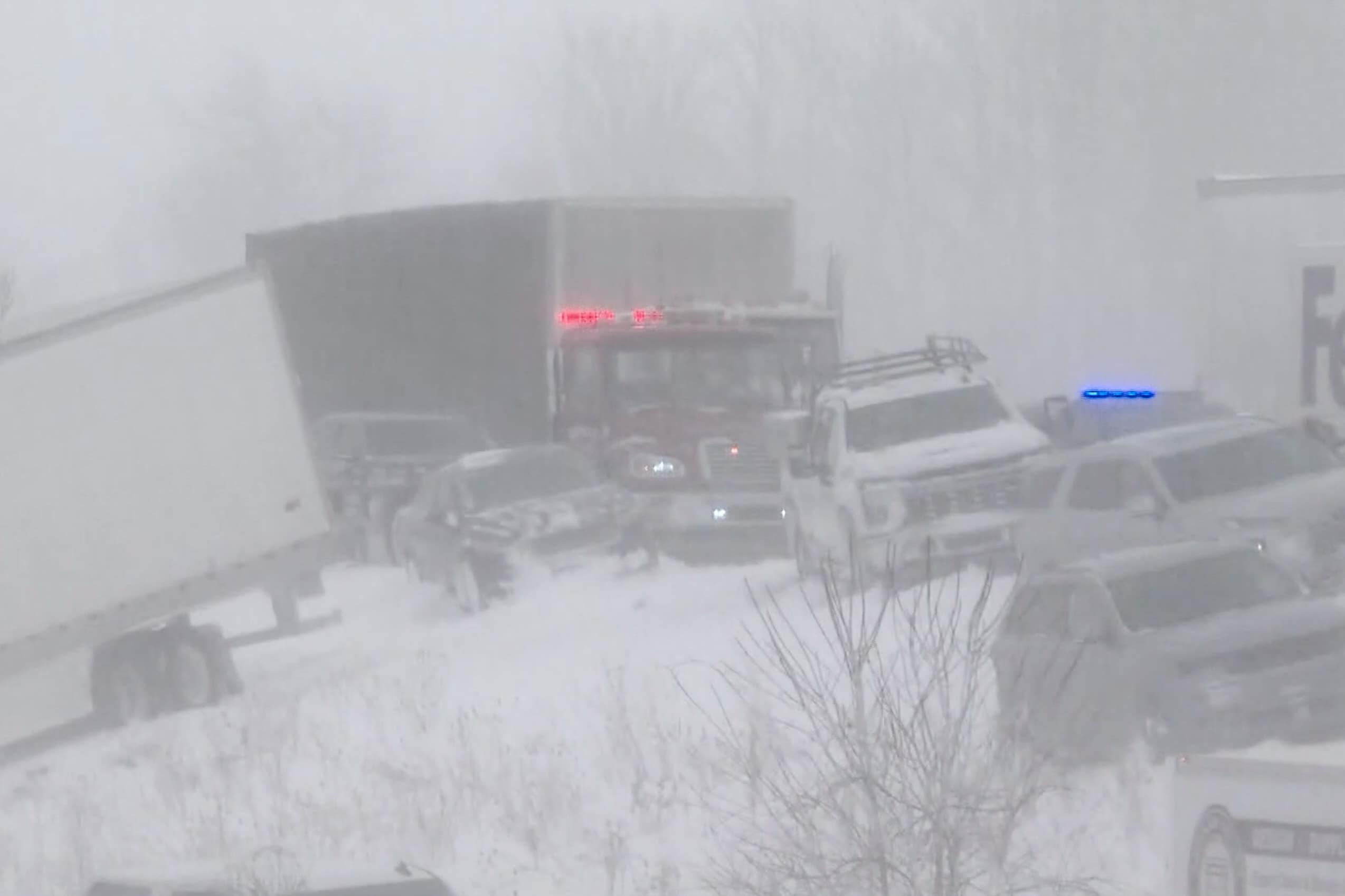100 vehicles pile up in Michigan crash as snowstorm sweeps US